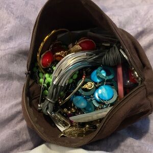Jewelry Bundle in a Brown Makeup bag.